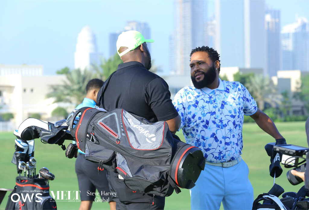 Golfers engaging with each other holding their clubs