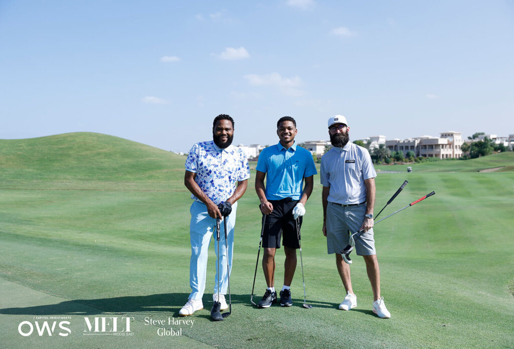 Golfers posing for a picture