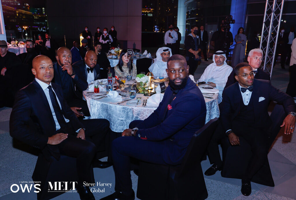 Picture of attendees at their table for dinner
