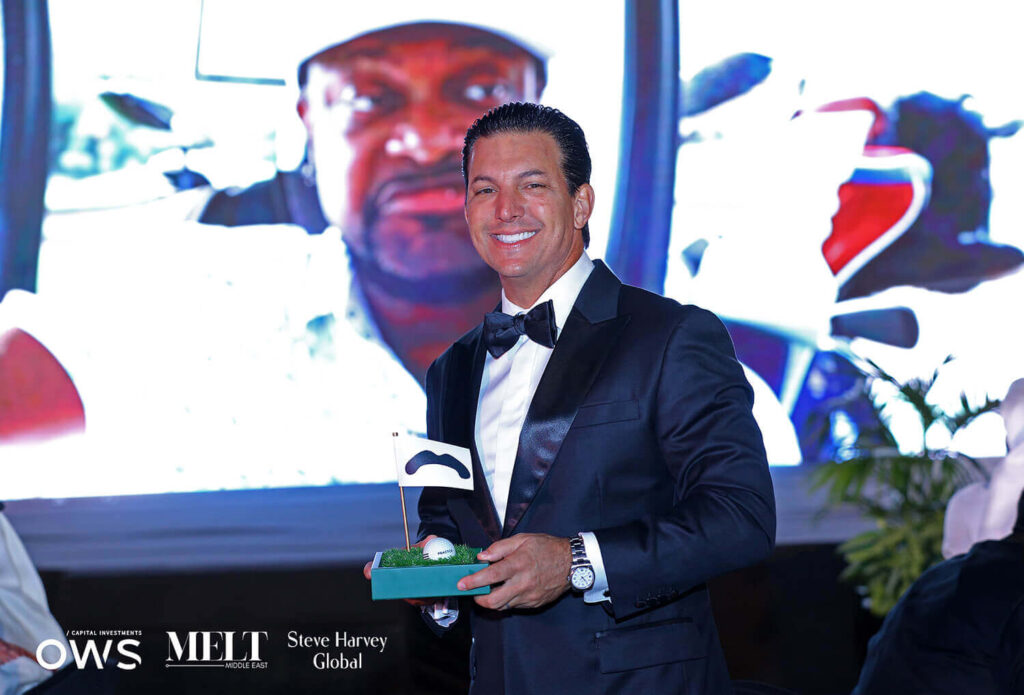Guest receiving award