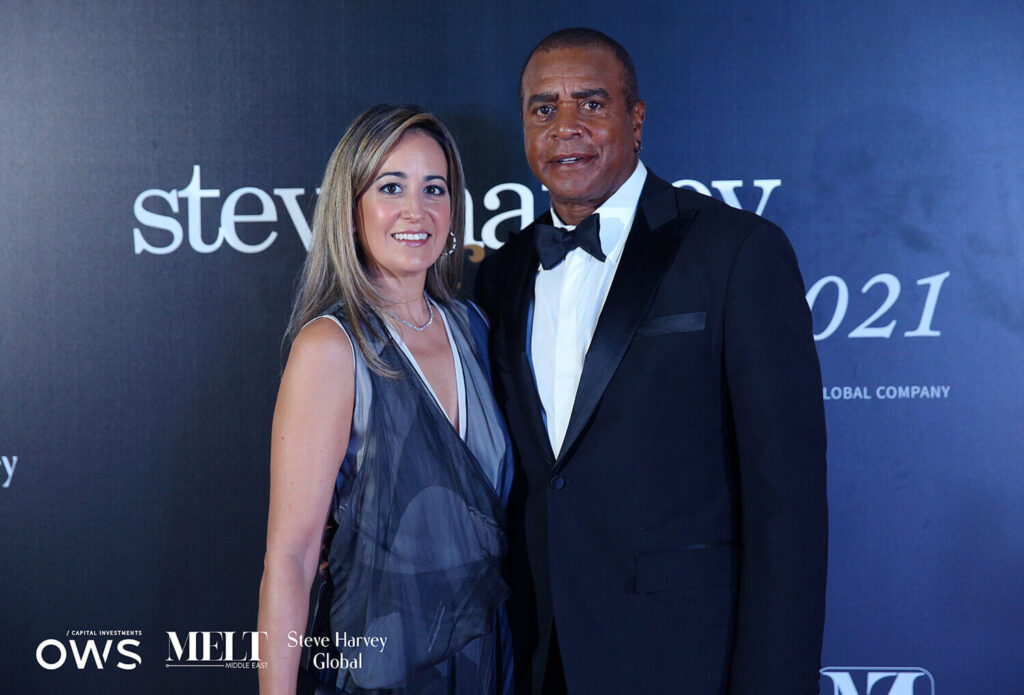 Guests posing on red carpet