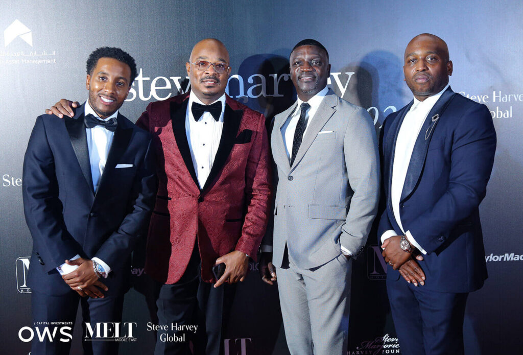 Guests posing on red carpet