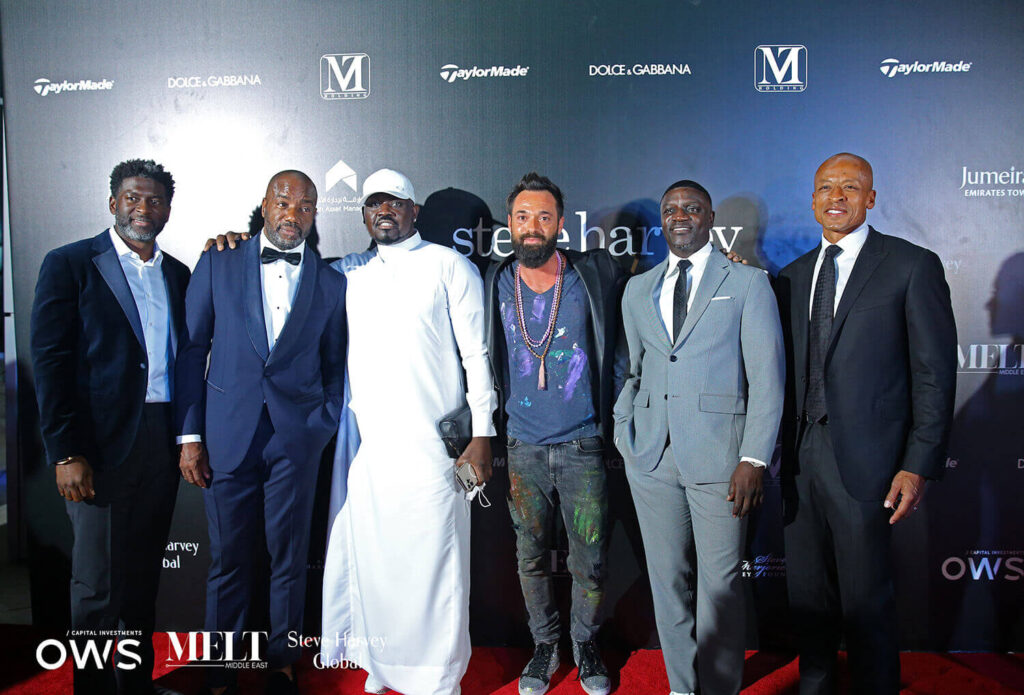 Guests posing on red carpet